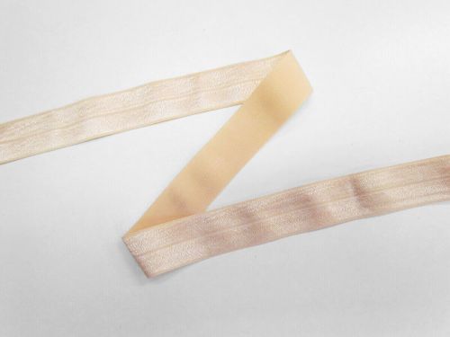 Great value 25mm Shiny Fold Over Elastic- Nude #T973 available to order online New Zealand